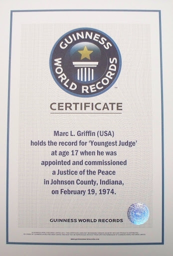 Guinness World Records certificate awarded to Marc L. Griffin stating he holds the record for Youngest Judge at age 17, appointed and commissioned as Justice of the Peace in Johnson County, Indiana, on February 19, 1974.